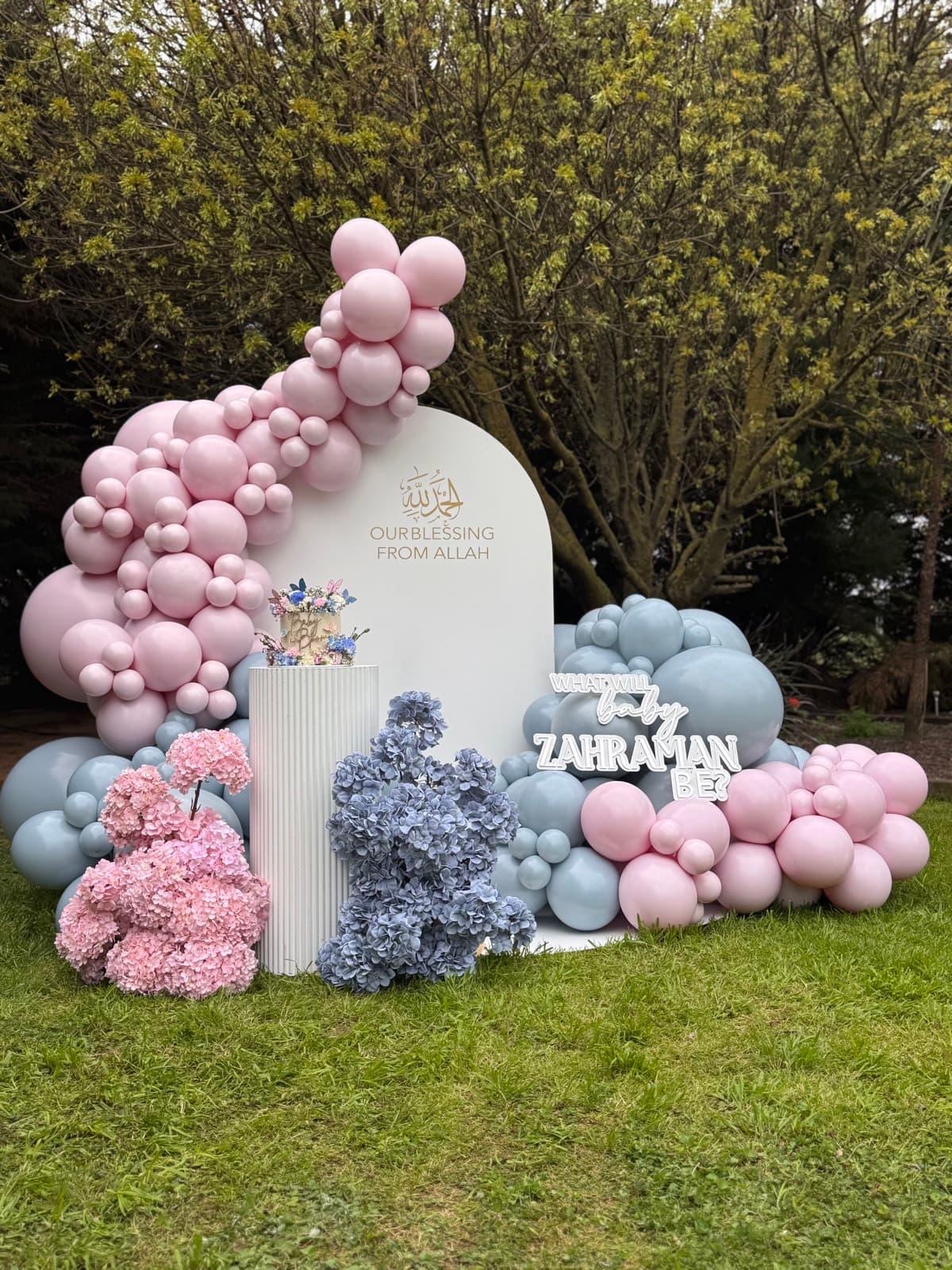 Birthday party styling with balloon installations and themed decorations