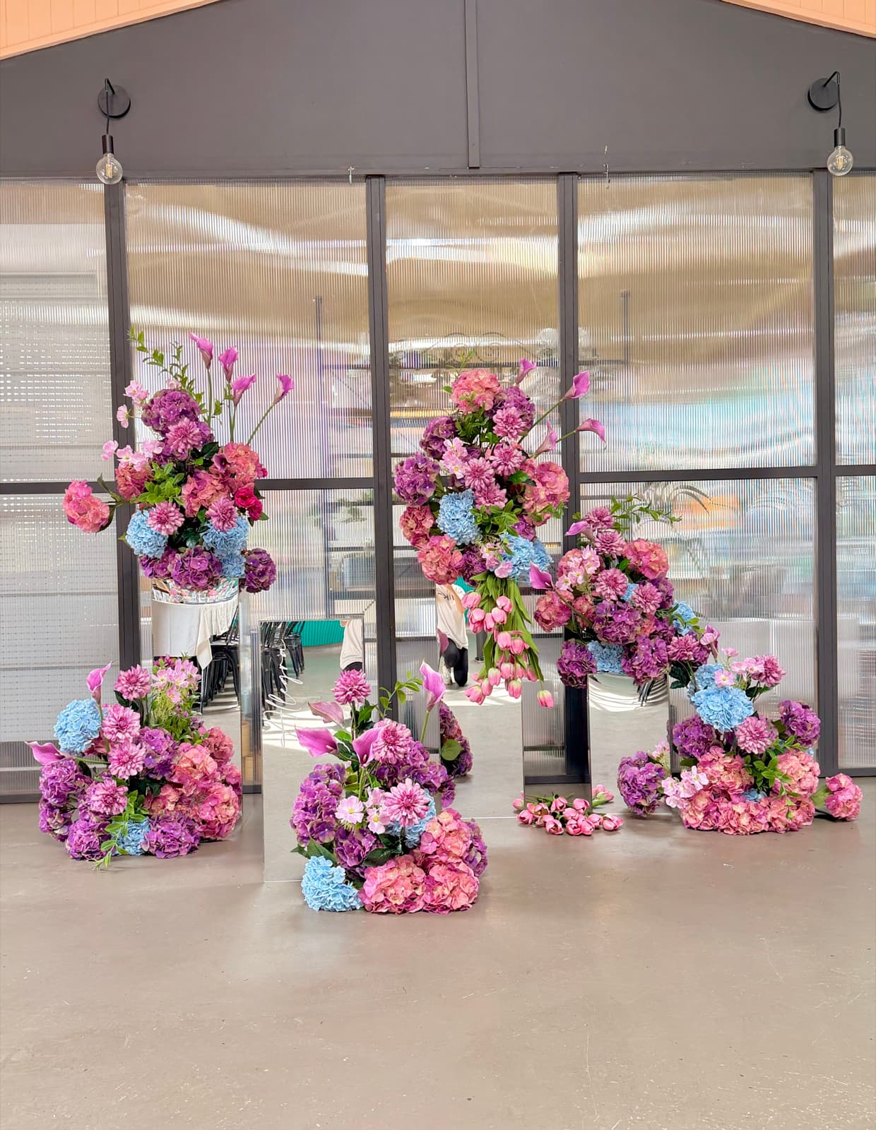 Birthday party styling with balloon installations and themed decorations