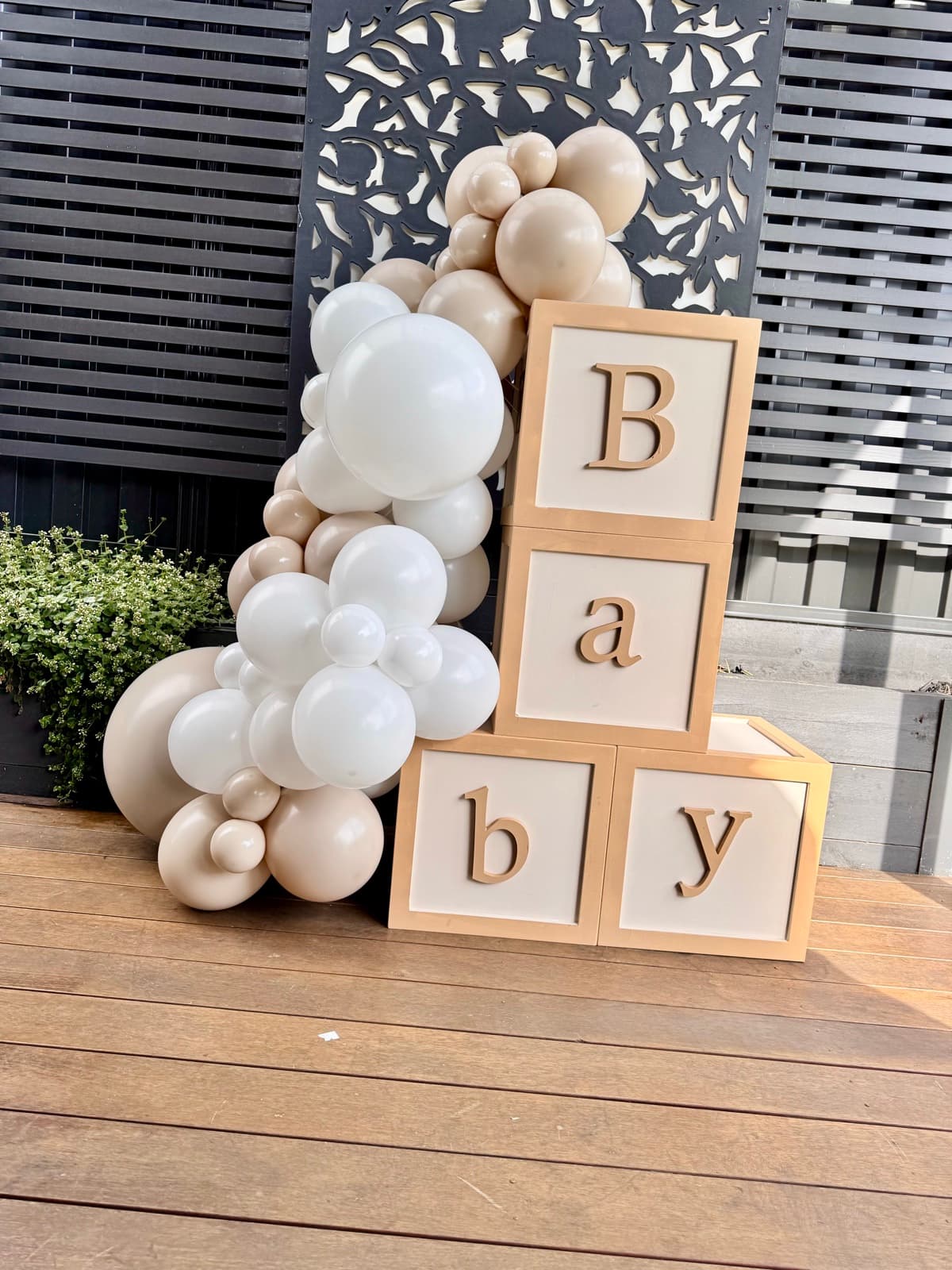 Birthday party styling with balloon installations and themed decorations