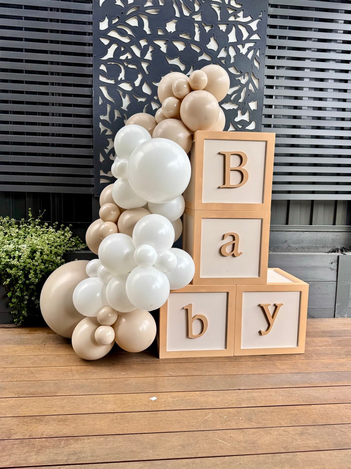 Birthday party styling with balloon installations and themed decorations