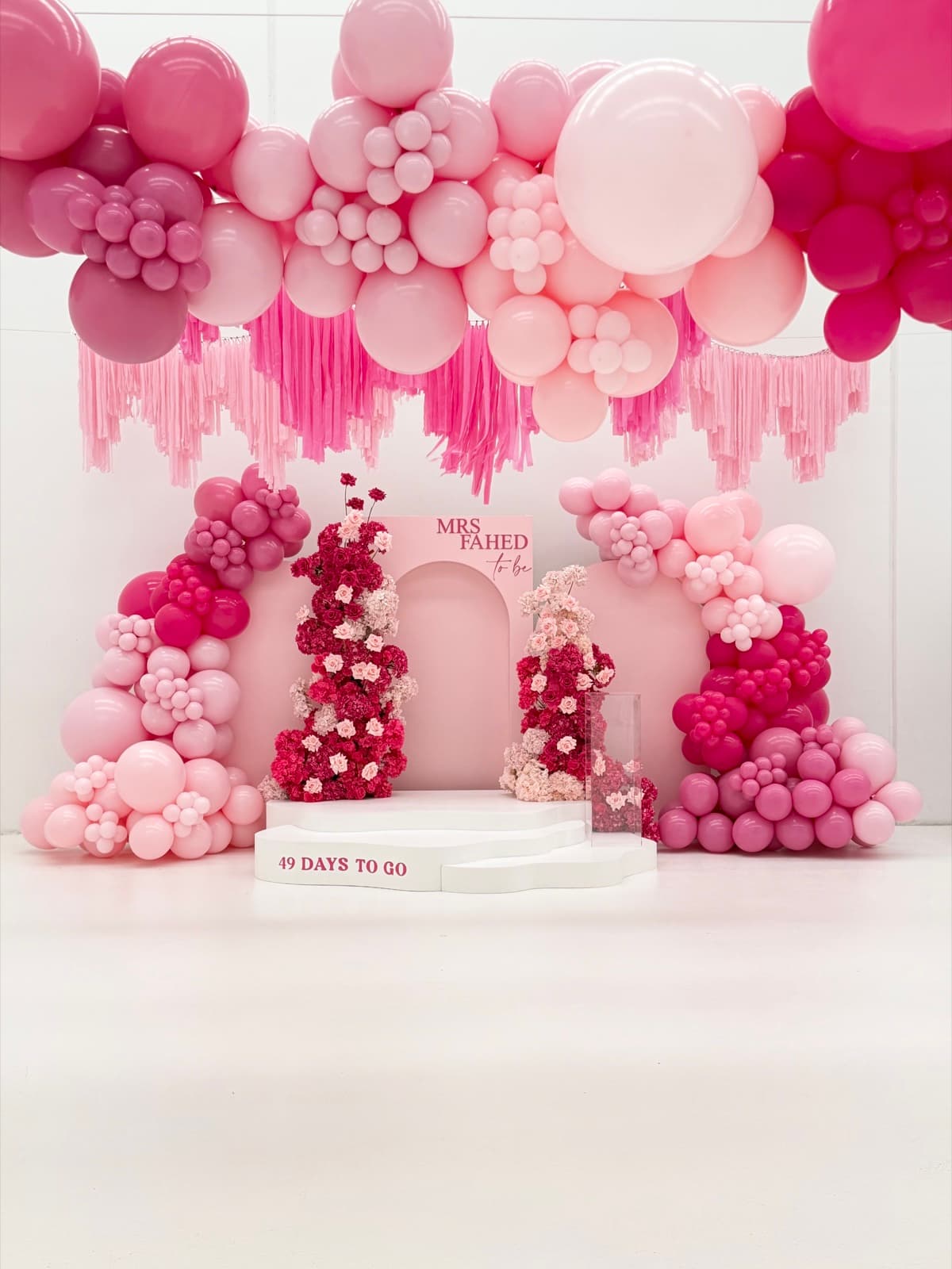 Birthday party styling with balloon installations and themed decorations
