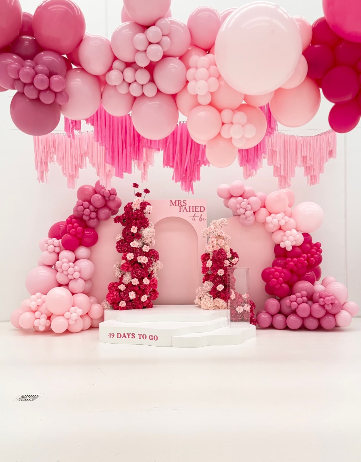 Birthday party styling with balloon installations and themed decorations