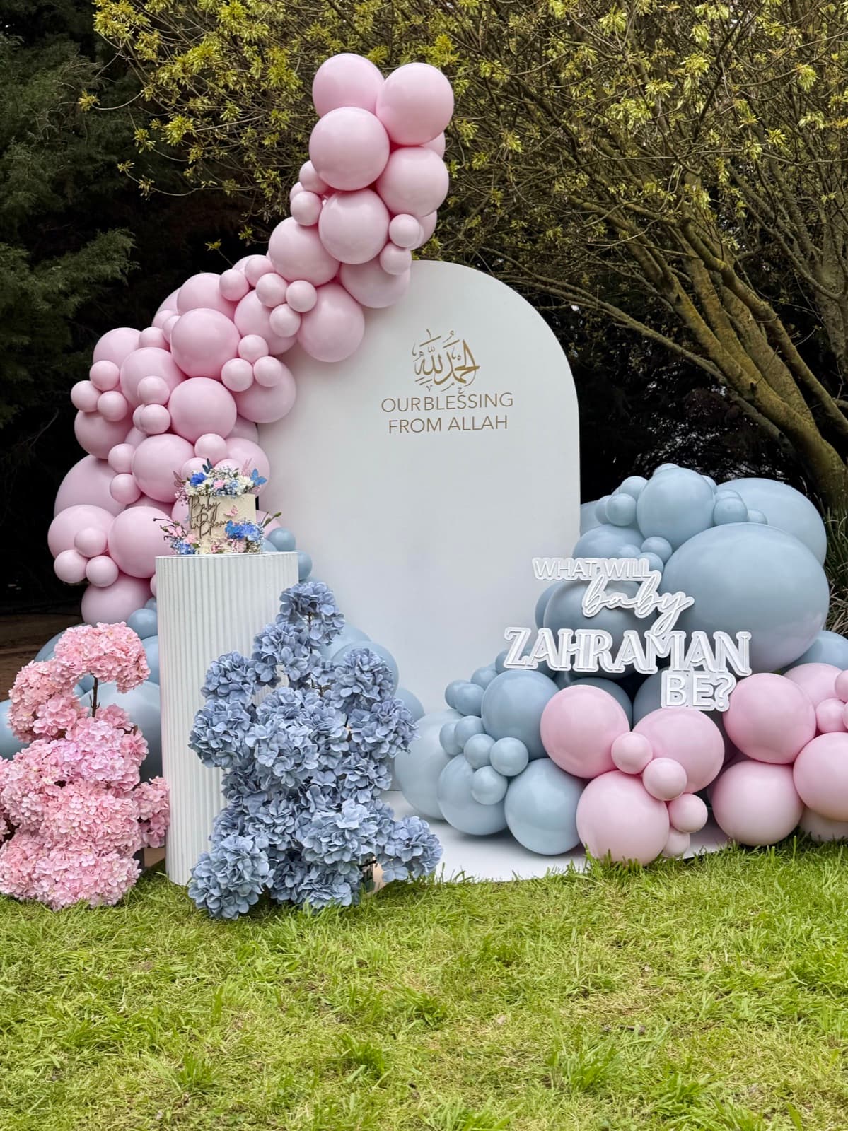 Birthday party styling with balloon installations and themed decorations