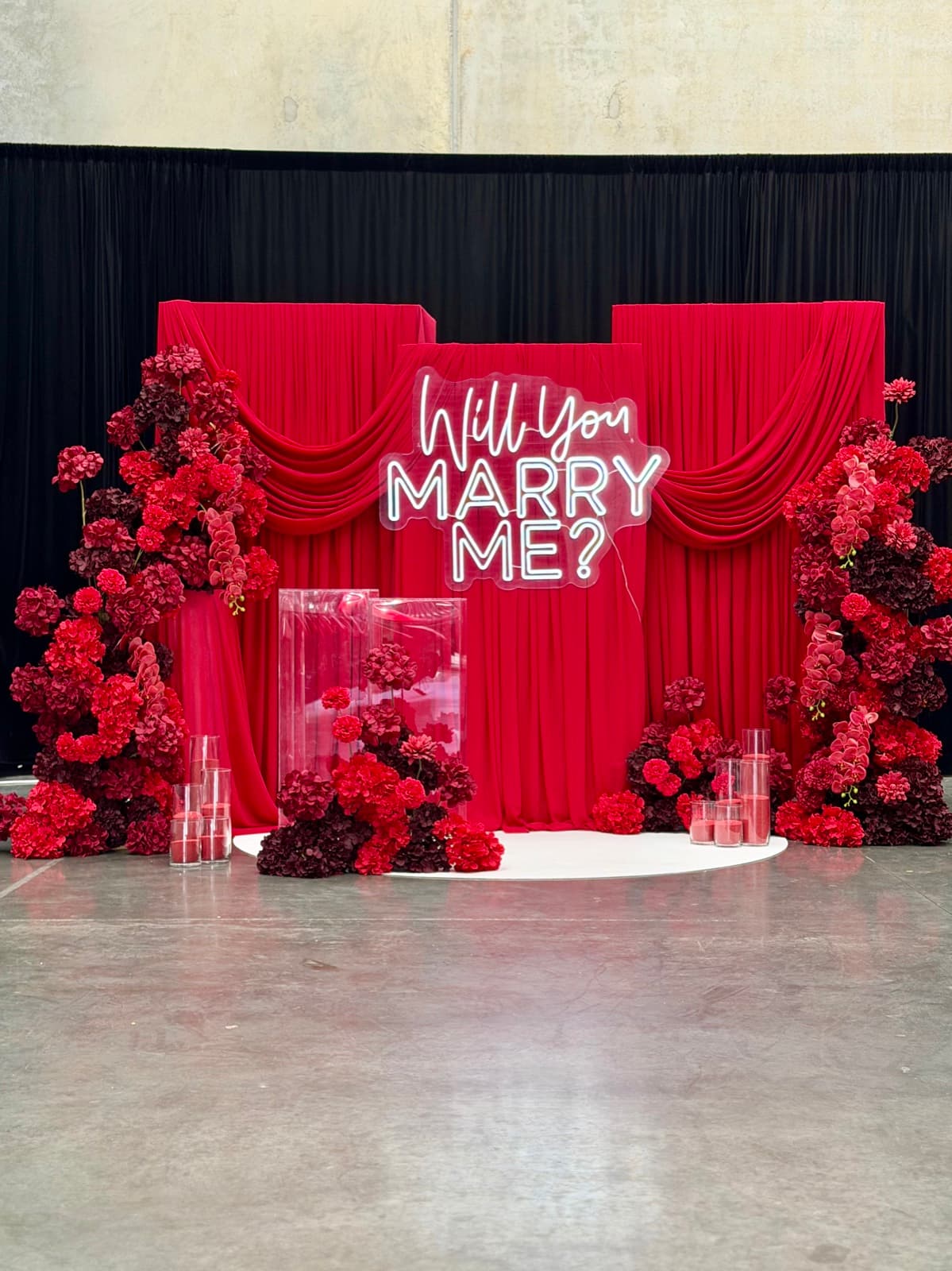 Engagement party styling with floral arrangements and elegant backdrops