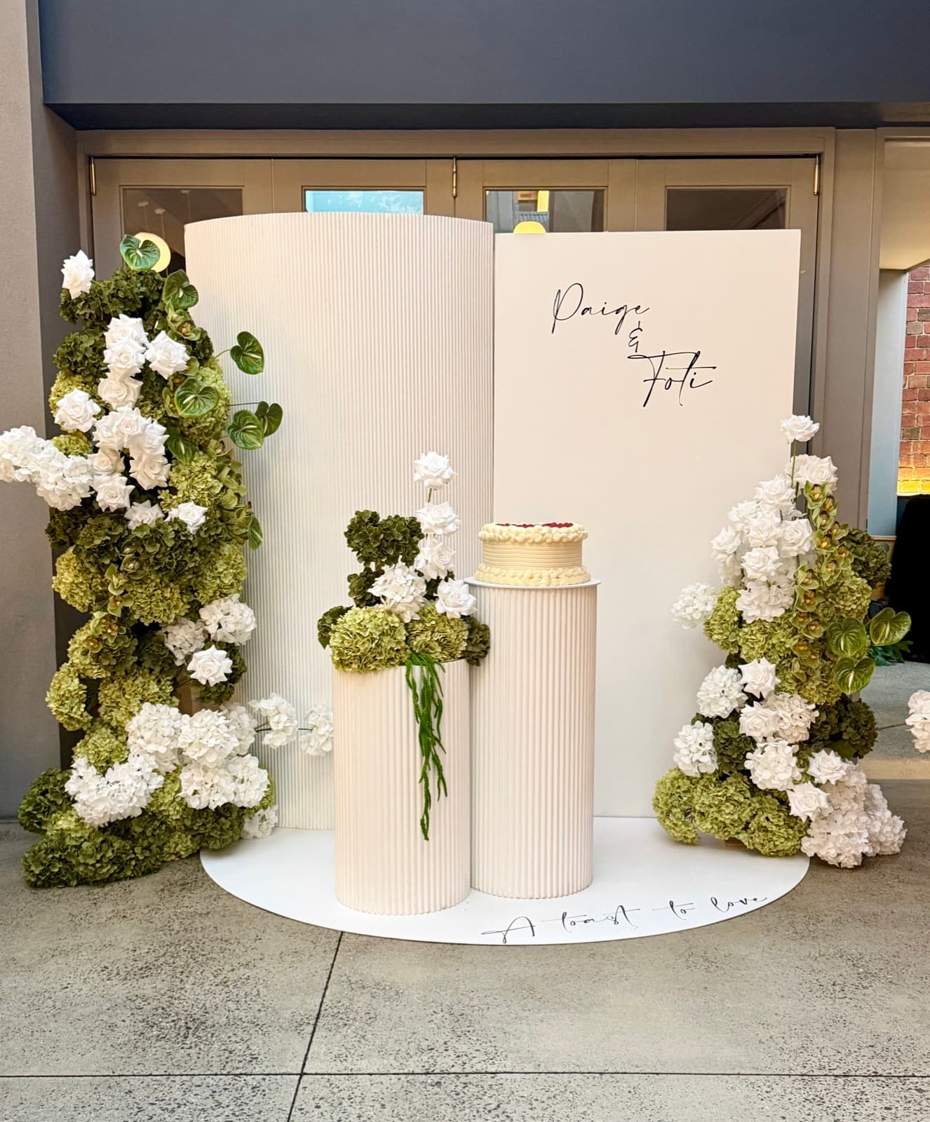 Engagement party styling with floral arrangements and elegant backdrops