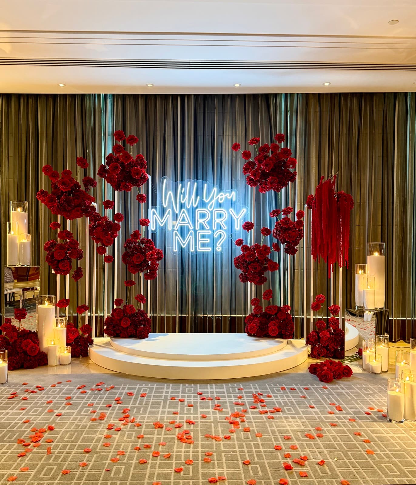 Engagement party styling with floral arrangements and elegant backdrops