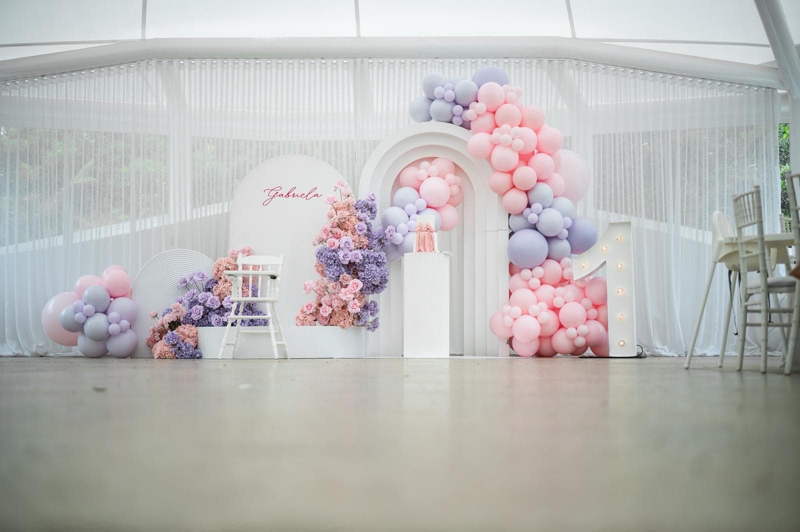 Wedding reception styling with draping florals and table settings
