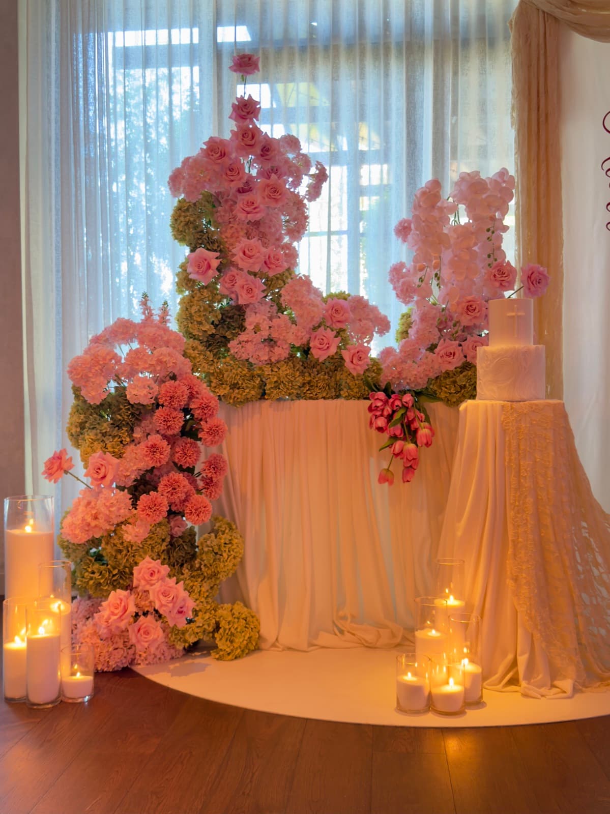 Wedding reception styling with draping florals and table settings