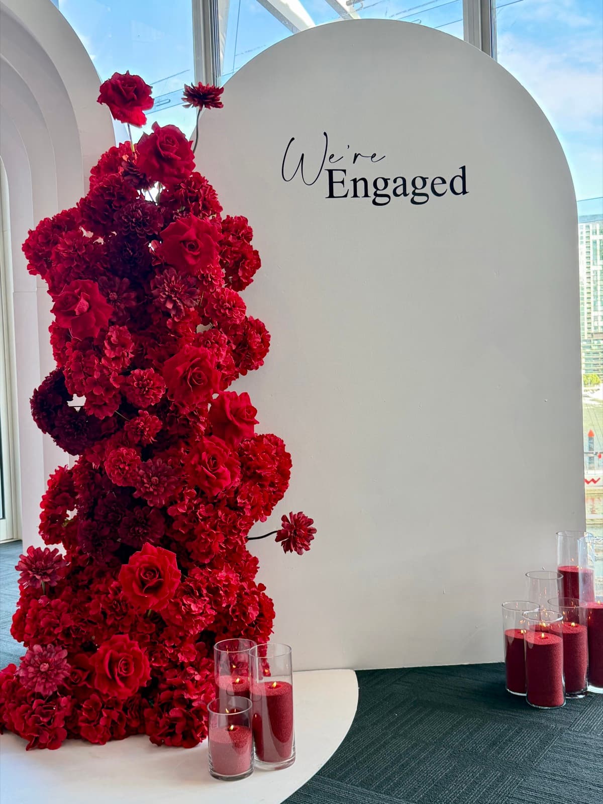 Engagement party styling with floral arrangements and elegant backdrops