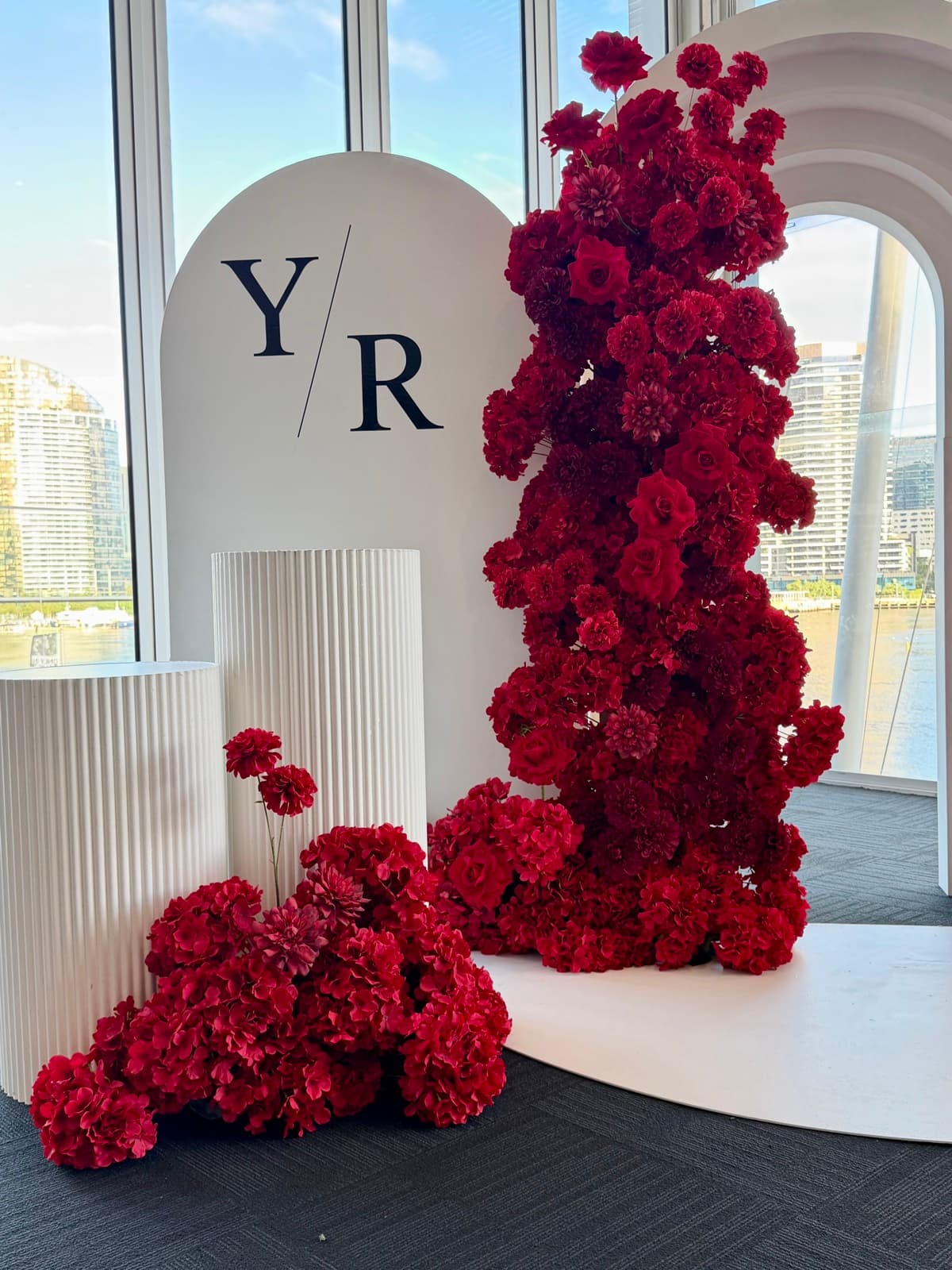 Engagement party styling with floral arrangements and elegant backdrops