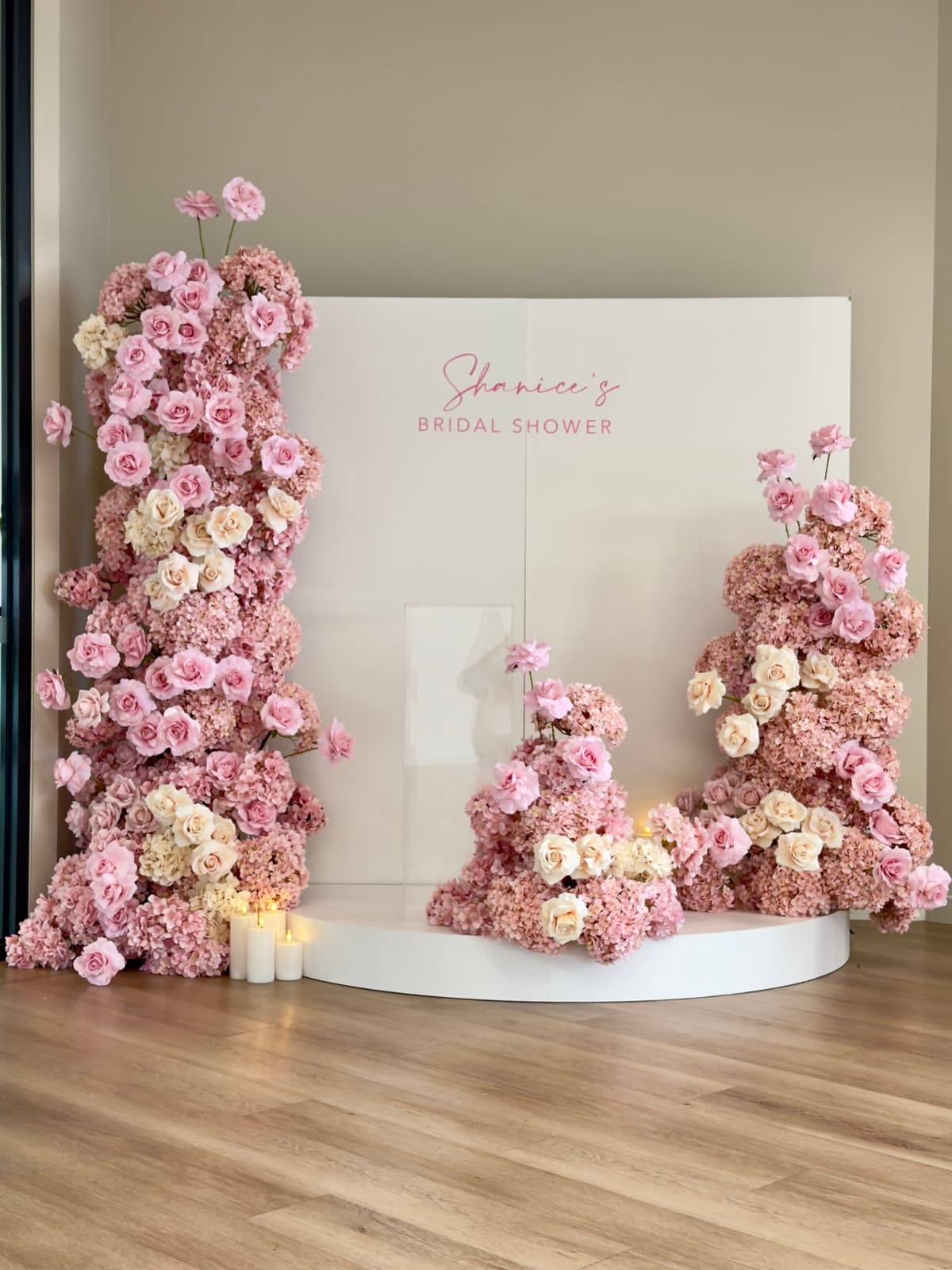 Engagement party styling with floral arrangements and elegant backdrops