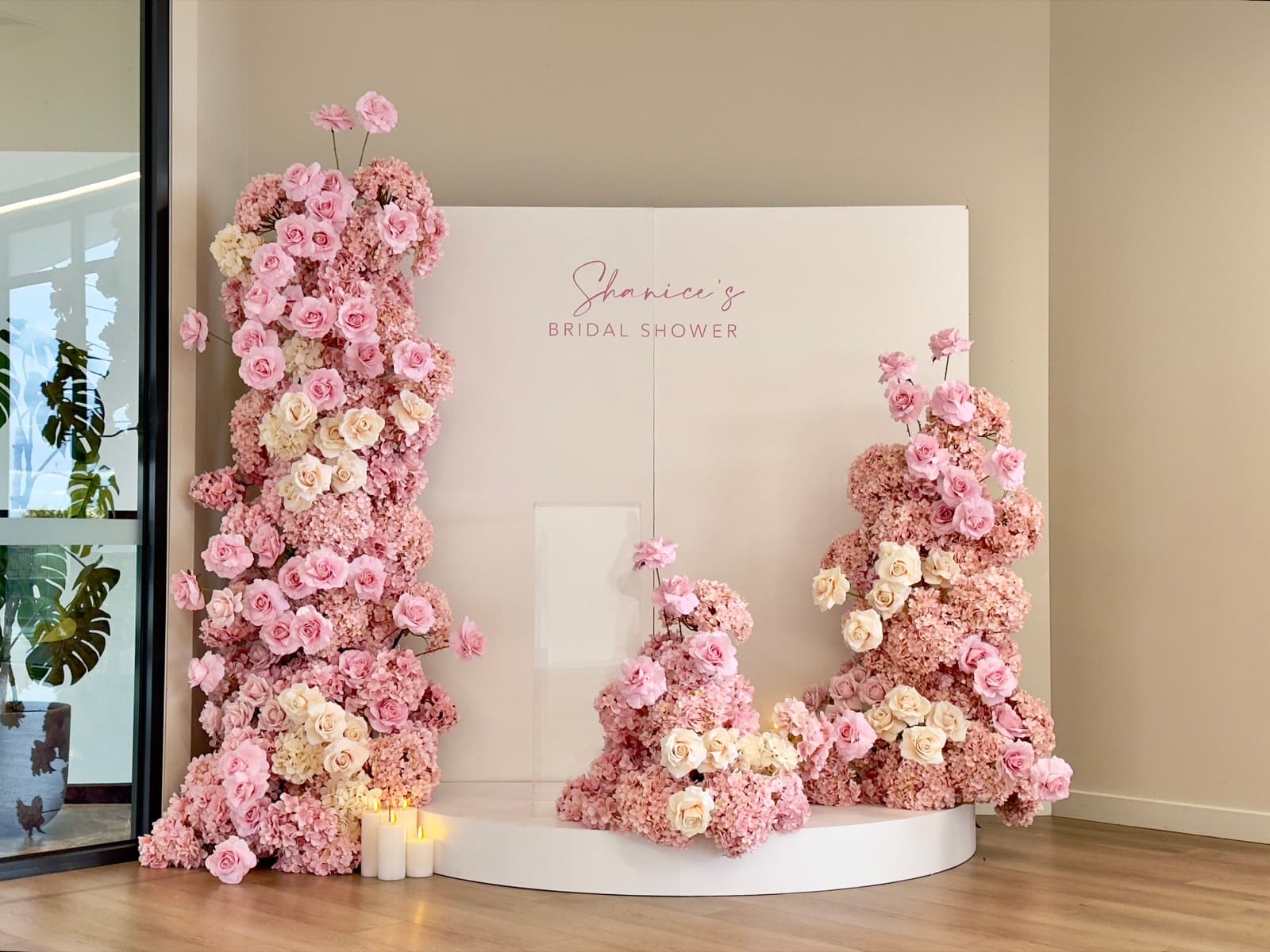 Engagement party styling with floral arrangements and elegant backdrops